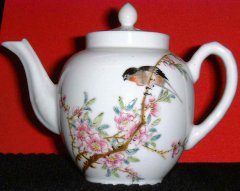 antiquehandpaintedteacup.jpg