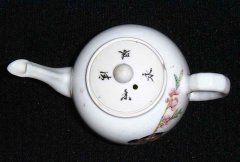 antiquehandpaintedteacuptop.jpg